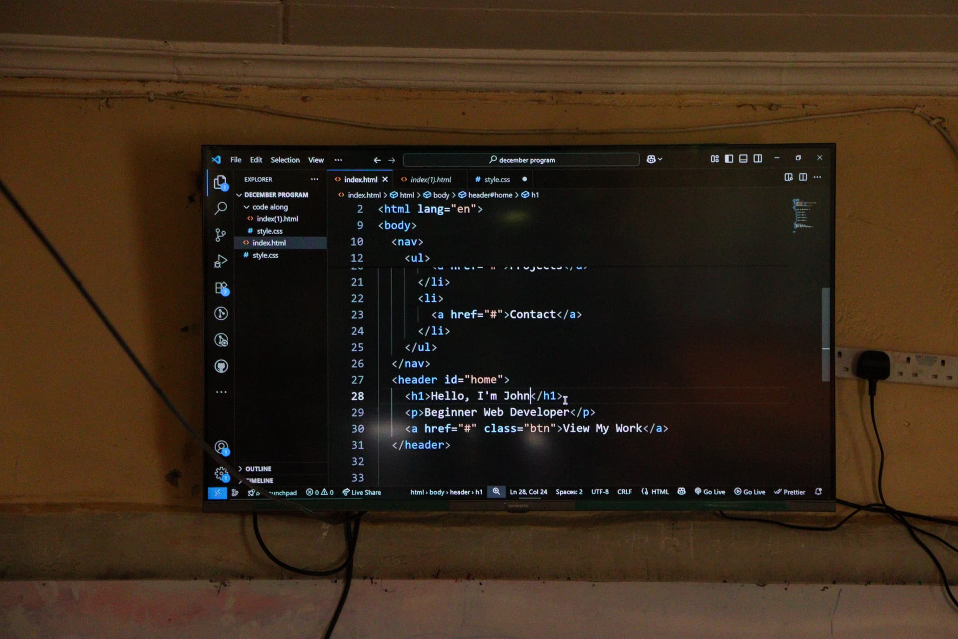 Live web development code-along on screen during a GGF coding class