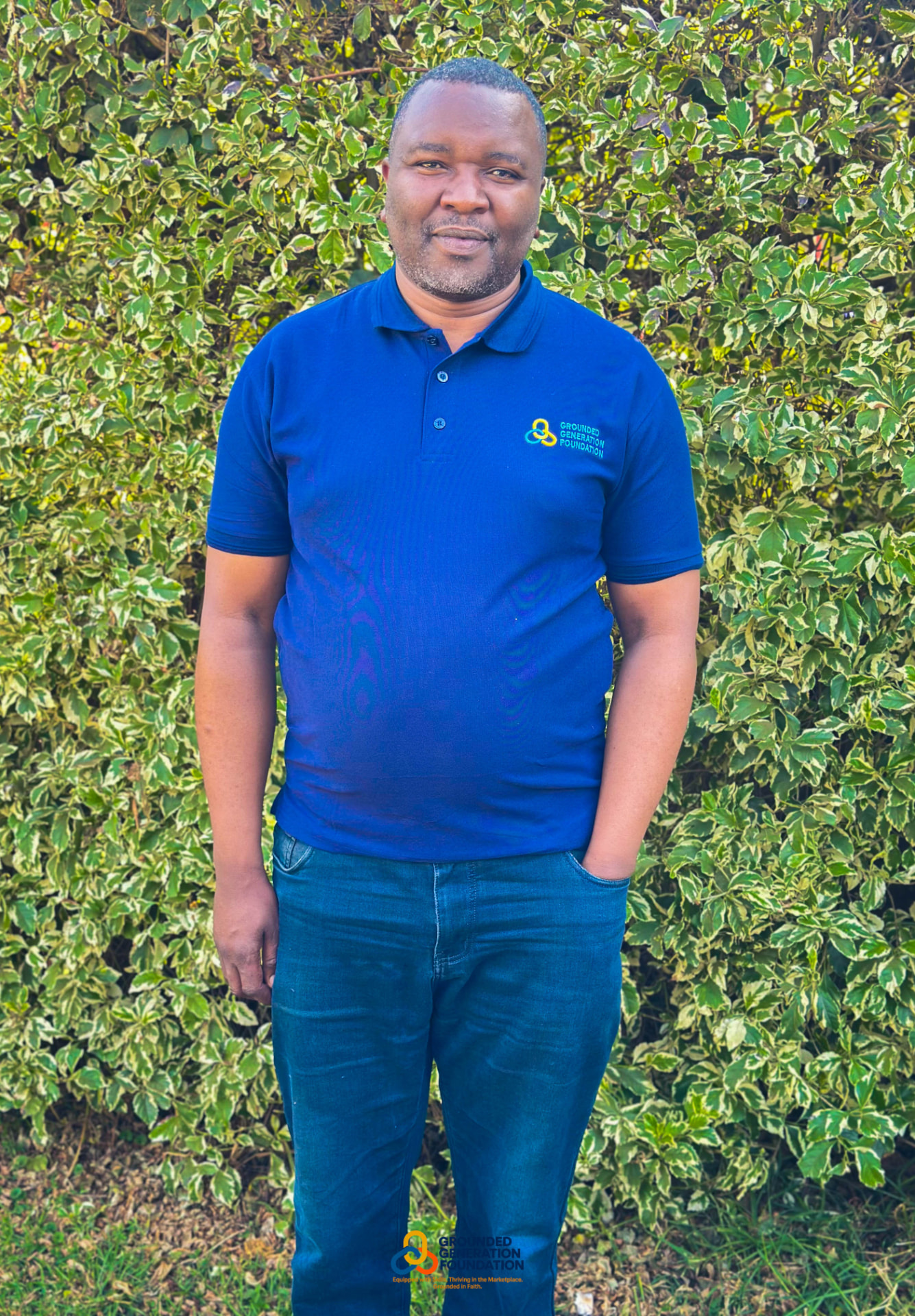 A GGF mentor in a branded polo
