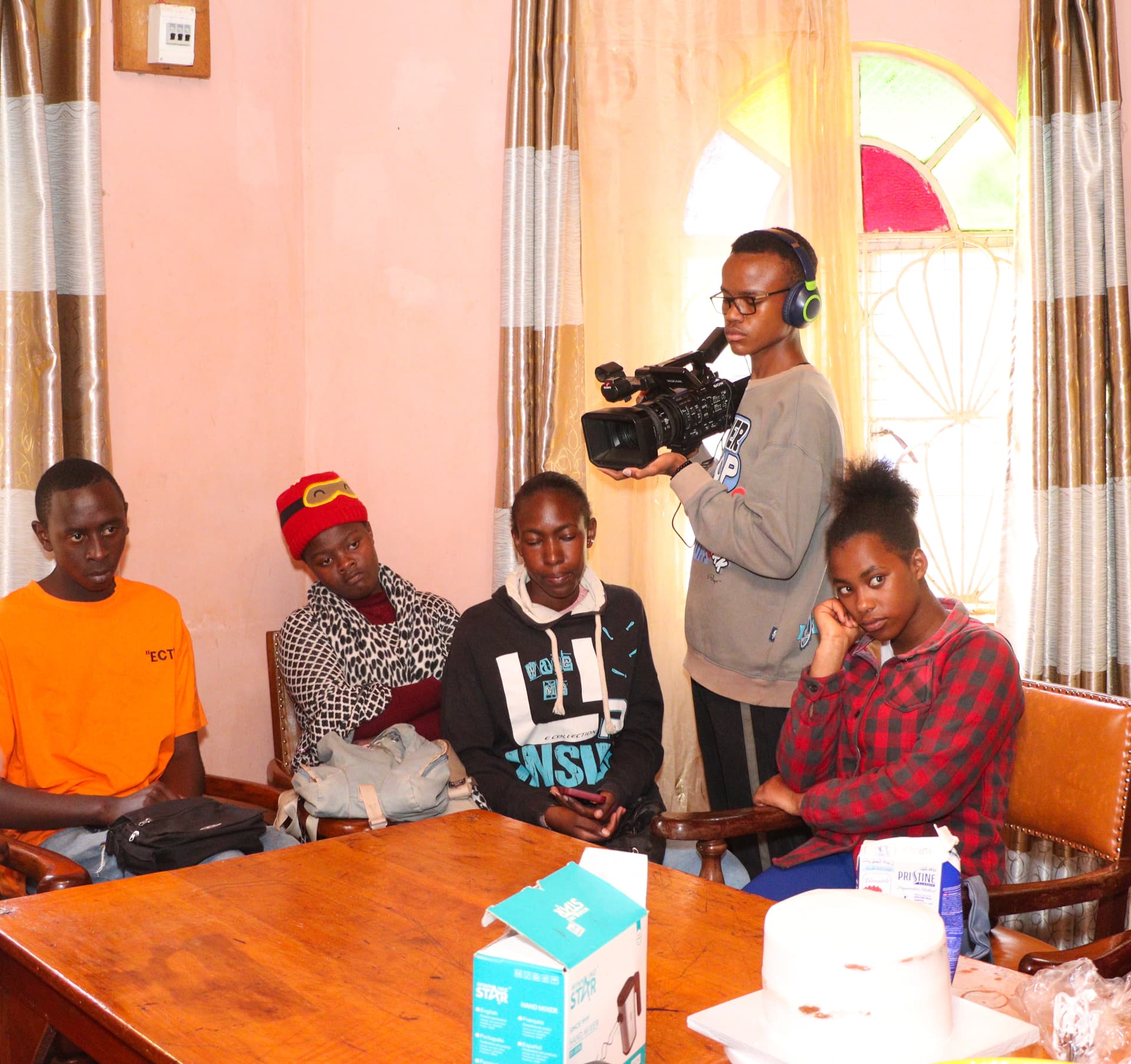 A learner filming a session with a professional video camera