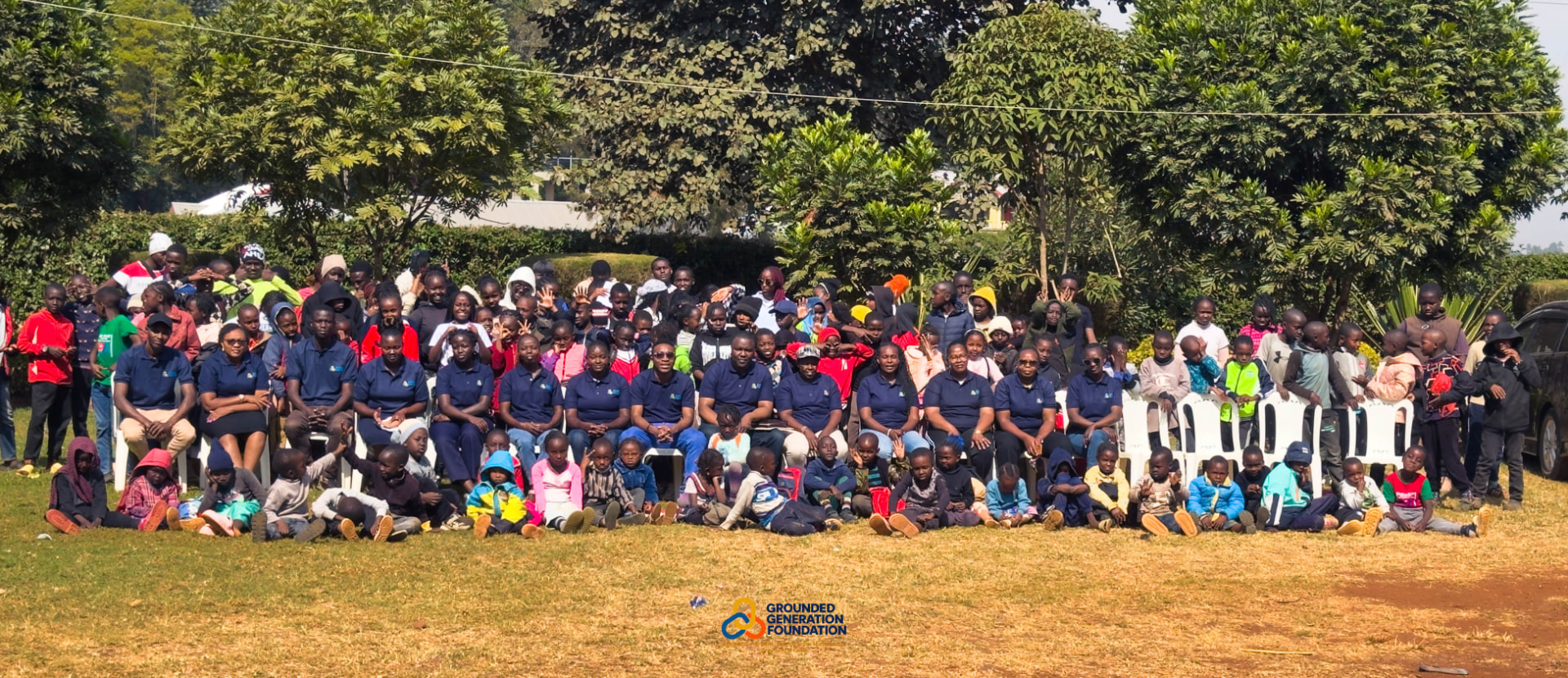 GGF team and community gathered outdoors for a group photograph