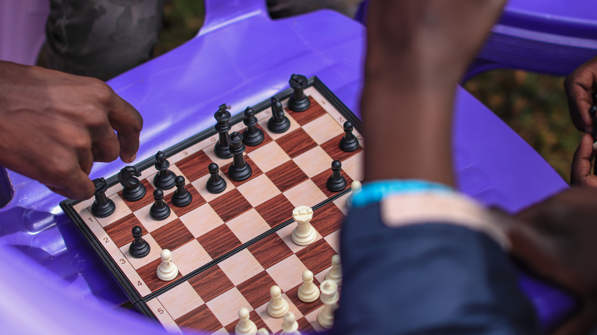 Youth playing chess — a mindful activity in a GGF session