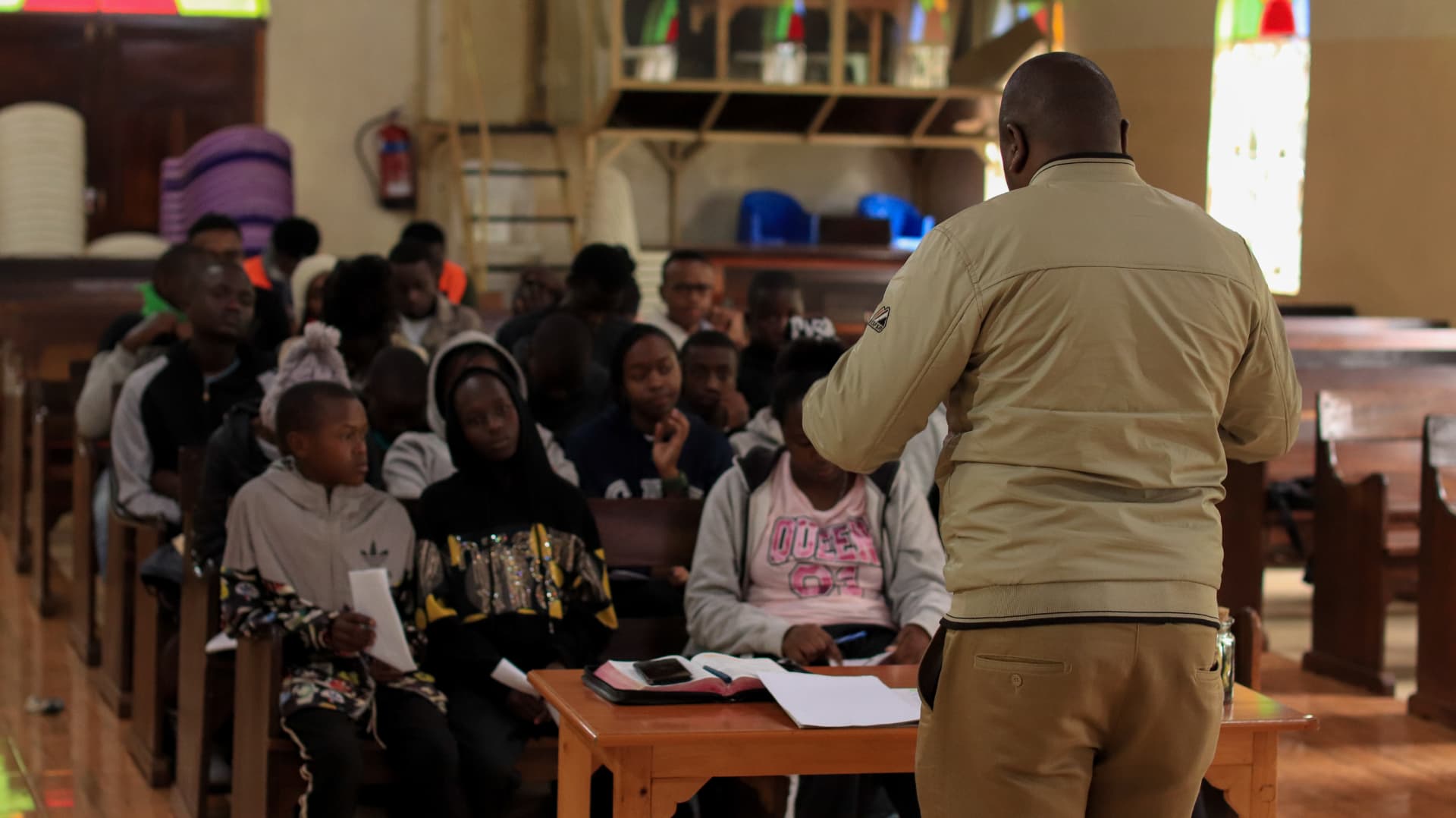 A GGF facilitator addressing youth during an employability session