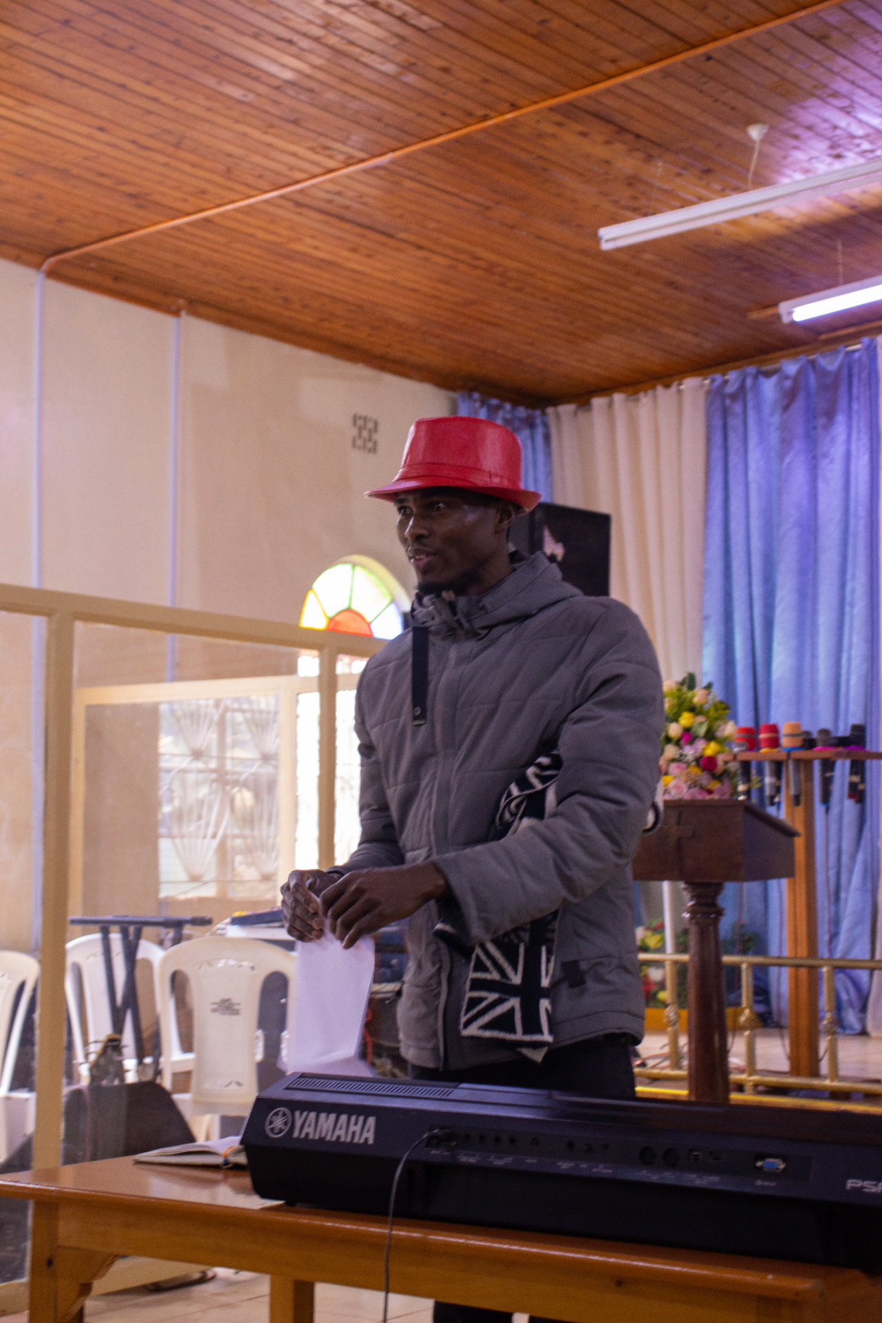 A young musician training on a keyboard