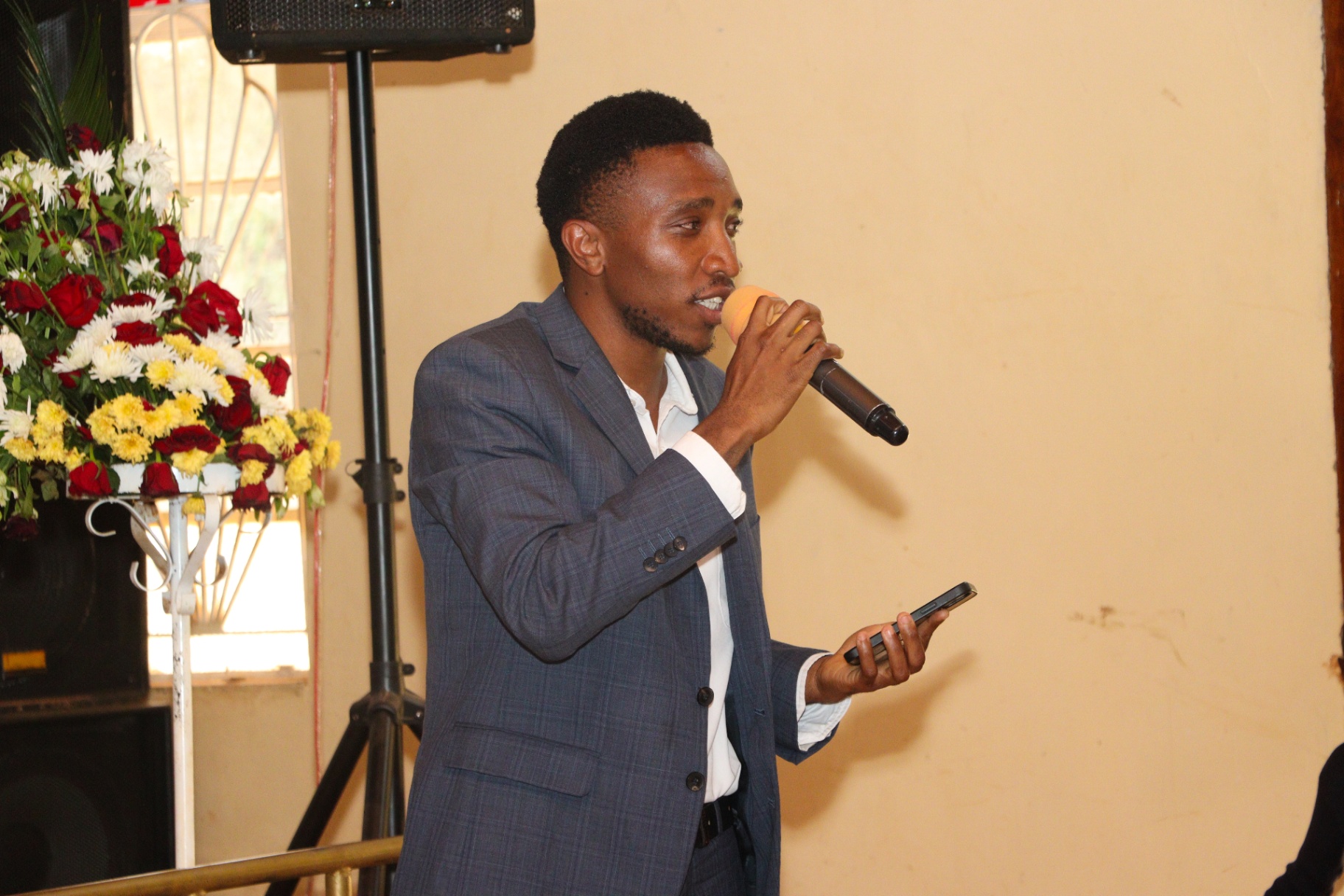 A speaker teaching young people on faith and leadership