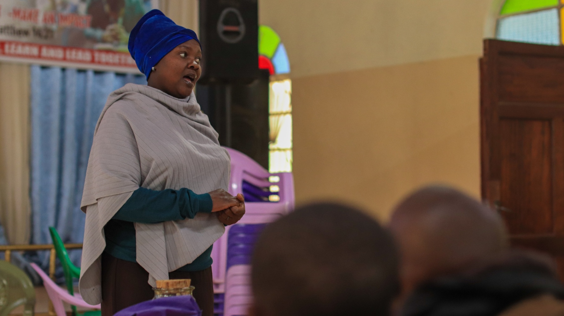 A counsellor speaking with young people at GGF