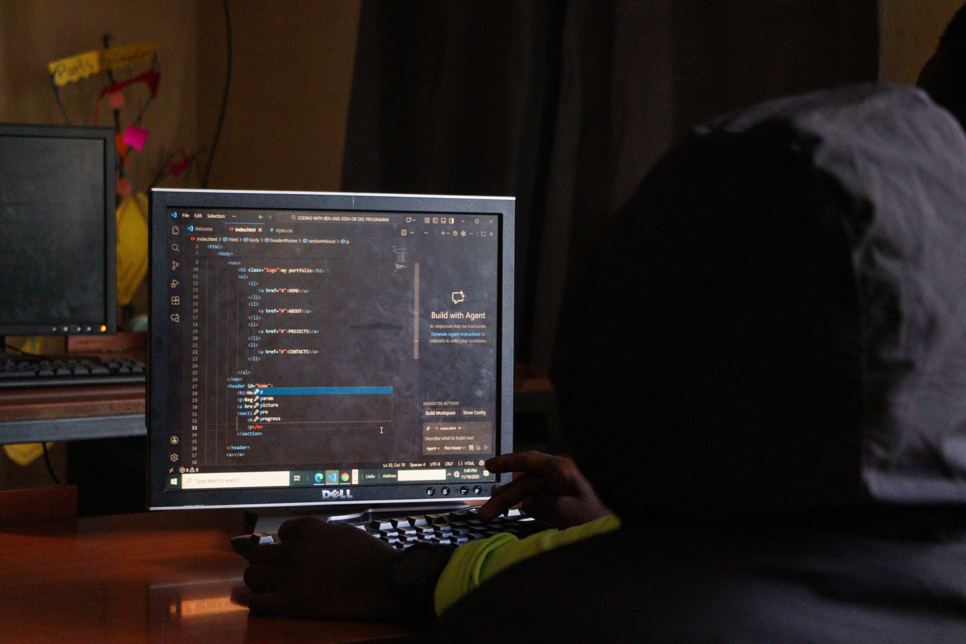 A young person learning coding